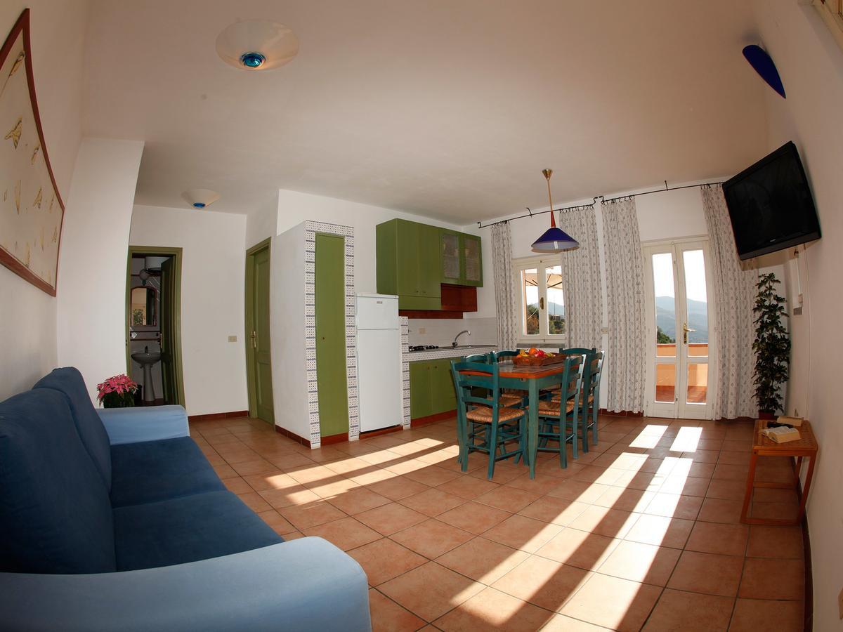 Residence Le Solane Marina di Campo Pokoj fotografie